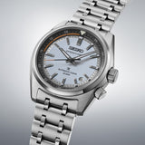 The Seiko Prospex Speedtimer Men’s 39.50mm Watch HBC003J reveals the dial’s applied indexes, Prospex logo and orange seconds hand in close detail. The date window sits at 4:30.