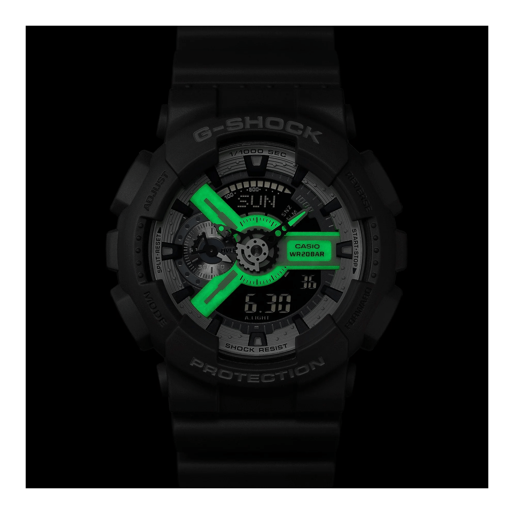 Lume on the Casio G-SHOCK GA110HD-8A analogue digital watch with grey resin band, layered black dial, and shock-resistant oversized design.