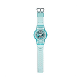 Casio G-SHOCK GMA-S110VW-2A analogue digital watch with transparent blue resin band, layered metallic dial, and shock-resistant design.