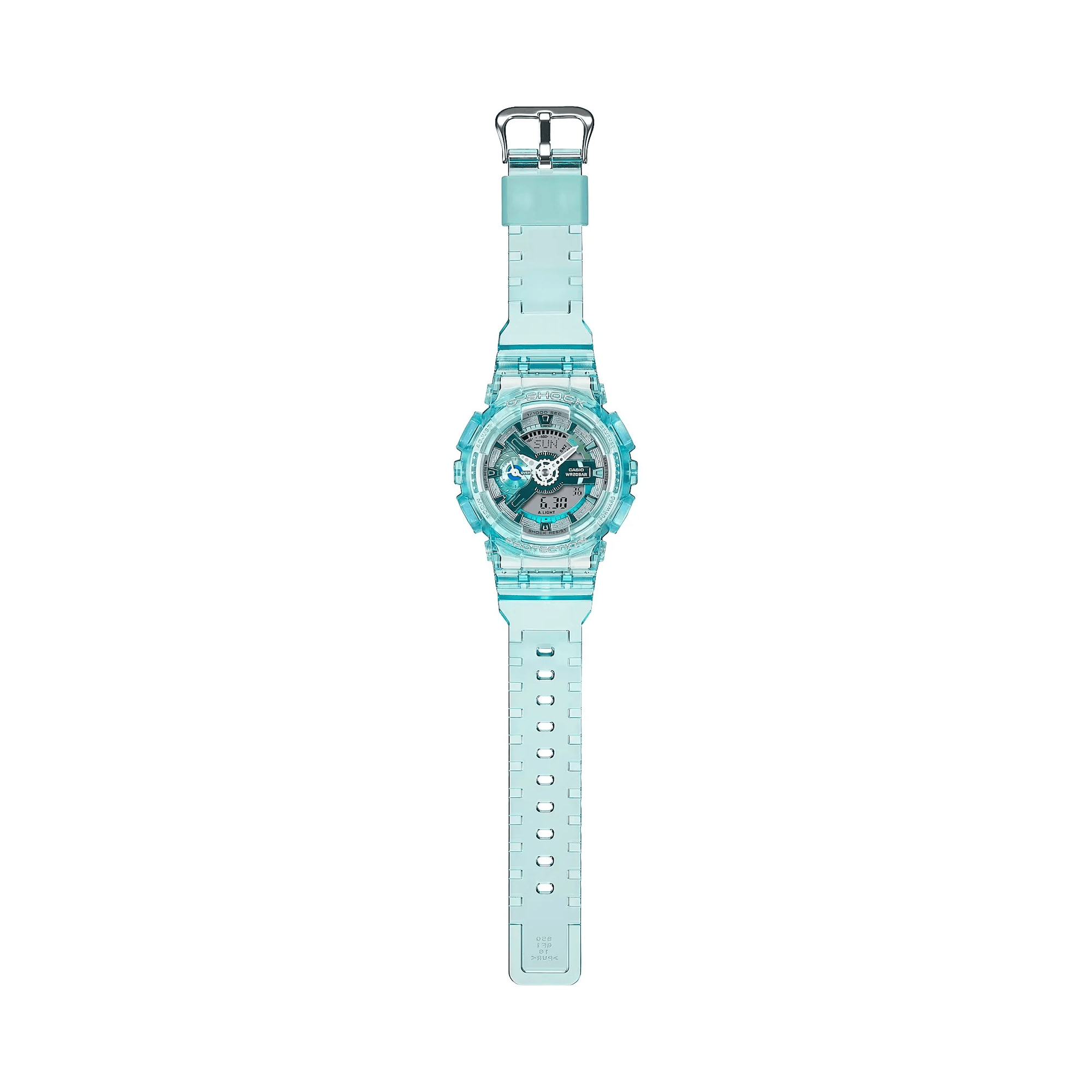 Casio G-SHOCK GMA-S110VW-2A analogue digital watch with transparent blue resin band, layered metallic dial, and shock-resistant design.
