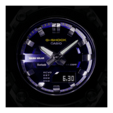 Casio G-SHOCK GSTB600A-1A6 analogue digital solar watch with black resin band, purple dial, stainless steel bezel, and Bluetooth connectivity.
