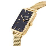 Three-quarter angle view of the Loyal Academy Gold Watch, reference 05A77FB01, showing the case profile and mesh bracelet construction. The 24.50mm case and deep, glossy natural stone dial are visible from this angle.