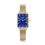 The Loyal Academy Gold Watch features a genuine Lapis Lazuli stone dial, framed by a Gold PVD case, reference 05A77FB01. This 24.50mm quartz watch pairs a mesh bracelet with a mineral glass lens and 30m water resistance.