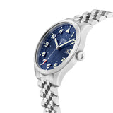Three-quarter angle view of the Loyal Adventurer Pilot Watch, reference 05C96MB01, showing the case profile and stainless steel bracelet construction. The 40mm case and 12 o'clock orientation triangle are visible from this angle, alongside the bonus blue leather strap included with this set.