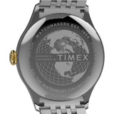 Close-up of the back of a stainless steel Timex watch with a metal link band, showing engraved globe graphics and text including 'TIMEX' and 'The Waterbury Collection' on a white background.