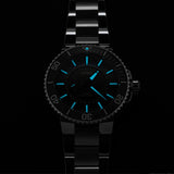 Oris Aquis Dat Watt Limited Edition II Men’s Automatic 43.50mm Watch 743 7734 4197-SET glowing in low light, with luminous hands and markers.