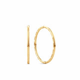 A pair of 9ct yellow gold sleeper hoop earrings shown front on, displaying their medium 13mm round silhouette with a polished finish and slim 1mm width.