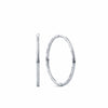 A pair of sterling silver sleeper hoop earrings shown front on, displaying their medium 13mm round silhouette. Crafted from solid silver, they're a durable, everyday style suitable for children.