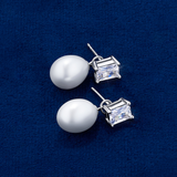 Front-on view of the Wallace Bishop Freshwater Pearl & Cubic Zirconia Drop Earrings in Sterling Silver, reference 33ECZ02, with butterfly backs.