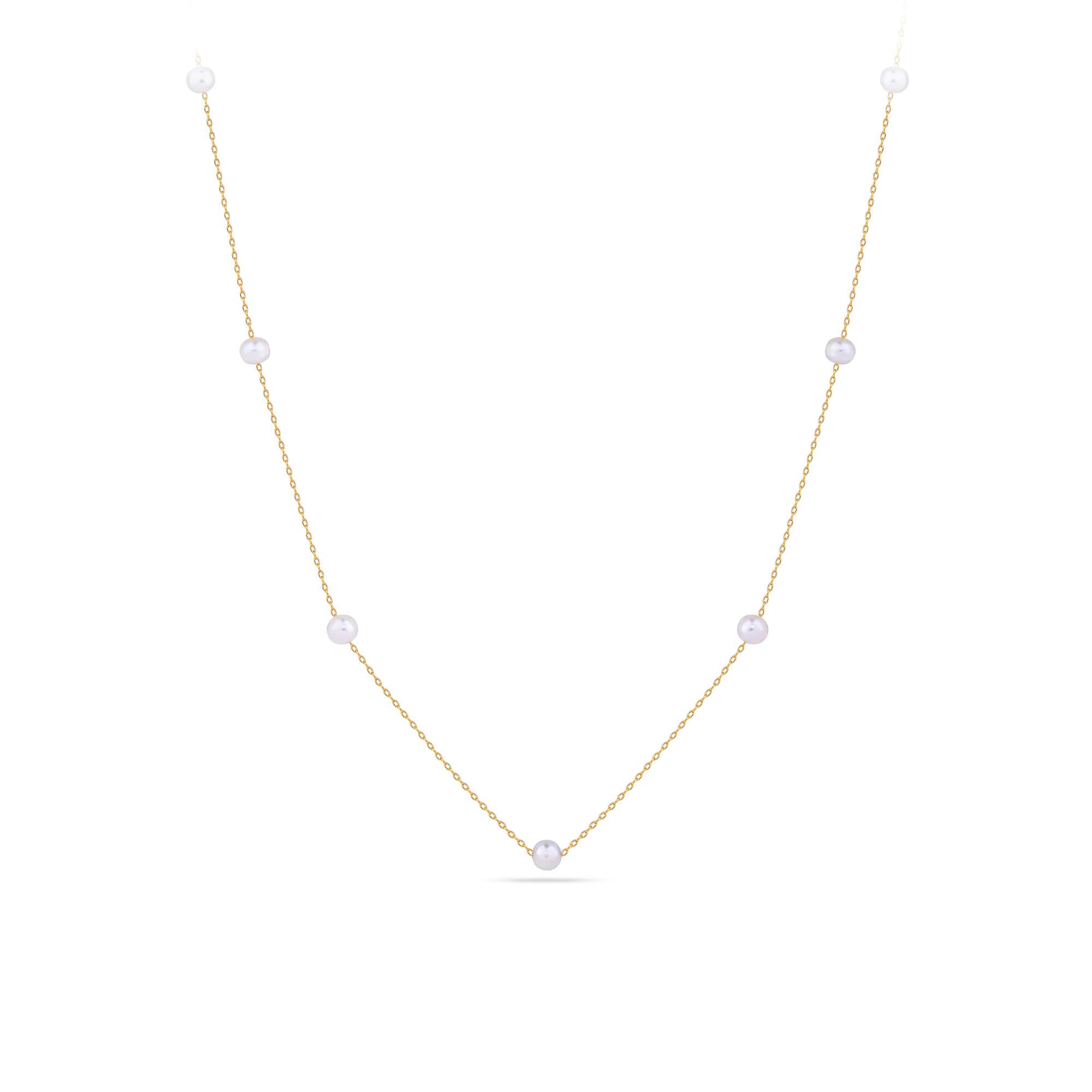 A delicate gold chain necklace featuring five evenly spaced, small white pearl beads, displayed on a clean white background.