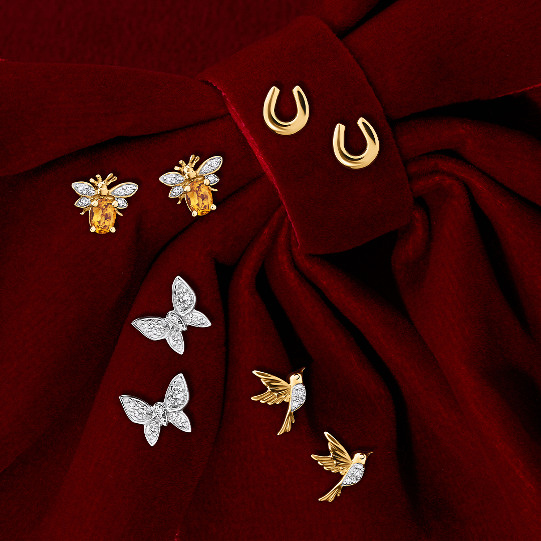 Front-on view of four pairs of Wallace Bishop stud earrings: the 0.06 TDW Round Diamond Butterfly Stud Earrings in 9ct White Gold, reference 3EBFL01W, the 0.03 TDW Round Citrine & Diamond Bee Stud Earrings in 9ct Yellow Gold, reference 93CBEE9Y, the 0.02 TDW Round Diamond Hummingbird Stud Earrings in 9ct Yellow Gold, reference 3ED02Y, and the Horseshoe Stud Earrings in 9ct Yellow Gold, reference 39ER130, with each pair shown as two earrings.