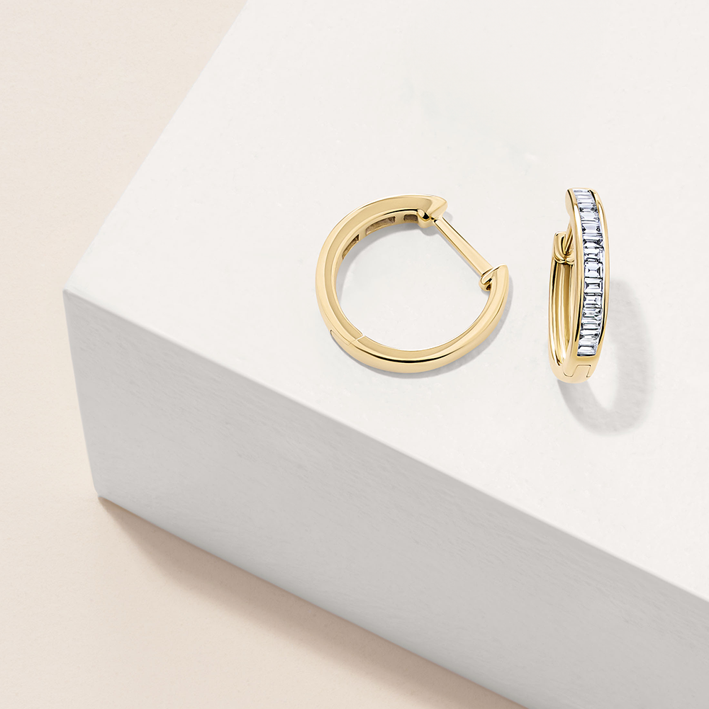 0.25ct TW Diamond Oval Huggie Earrings in 9ct Yellow Gold