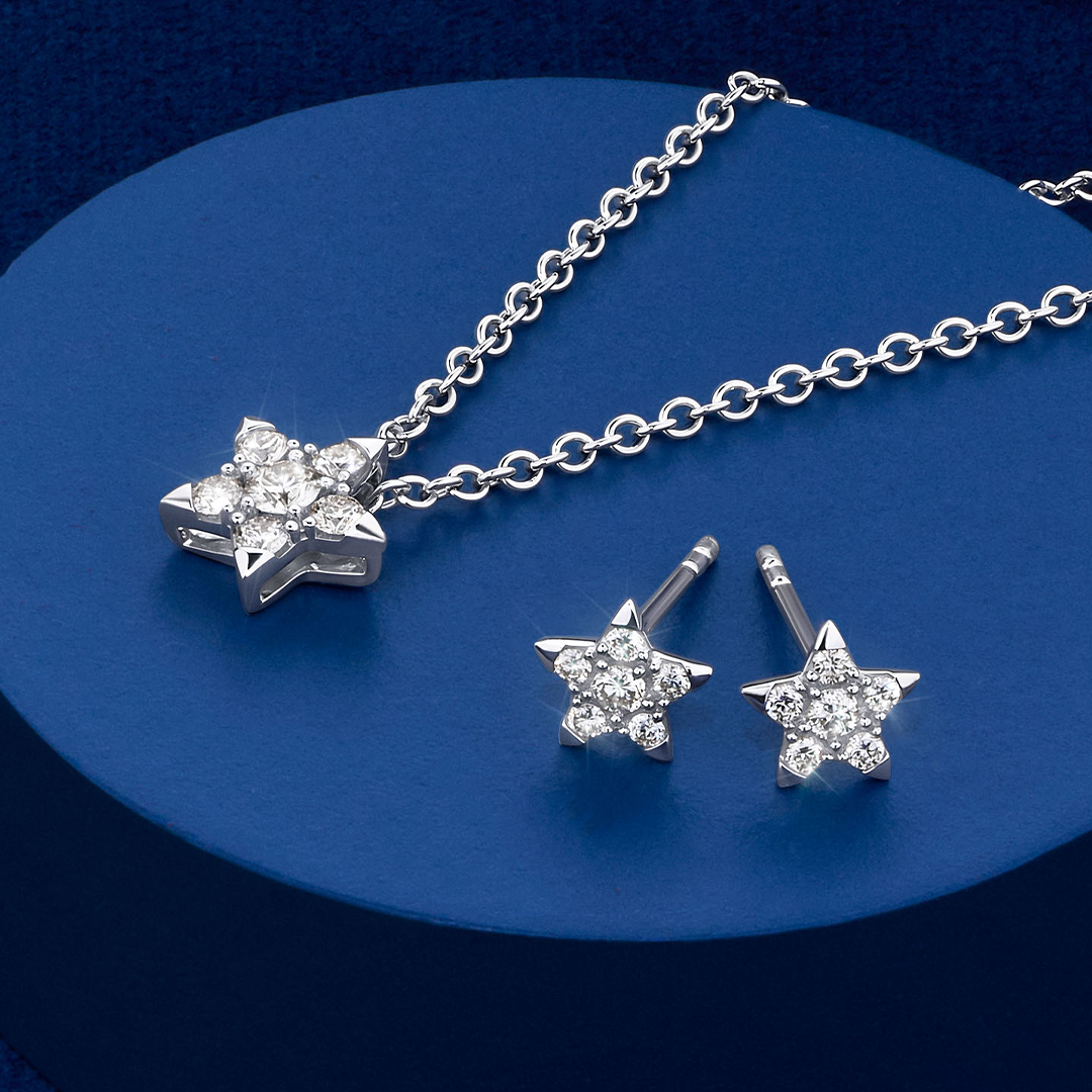 The Wallace Bishop 0.15 TDW Round Diamond Star Pendant in Sterling Silver, reference 3PSTARSS, on a 500mm (approximately 19.7 inch) cable chain, shown together with the 0.15 TDW Round Diamond Star Stud Earrings in Sterling Silver, reference 3ESTARSS. Both the pendant and the earrings feature a star design pavé set with natural round brilliant cut diamonds.