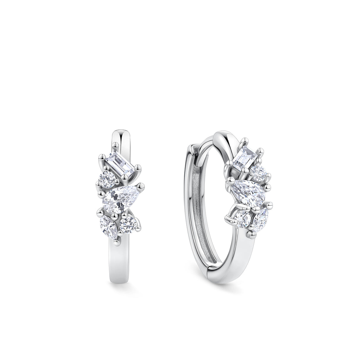 Front-on view of the Wallace Bishop Cubic Zirconia Scatter Huggies in Sterling Silver, reference 41ECZE01, with a 15mm huggie hoop. Each earring features a claw-set mix of baguette, marquise, pear and round cut white cubic zirconias for an asymmetric, scattered sparkle.