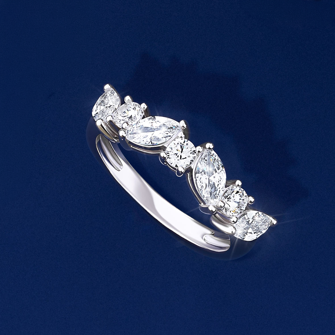 Front-on view of the Wallace Bishop Cubic Zirconia Cluster Ring in Sterling Silver, reference 41RCZD03O. The ring features seven claw-set white cubic zirconias, mixing marquise and round cuts to create a scattered, floral-inspired design.