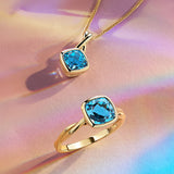 Cushion Cut Swiss Blue Topaz Twist Bezel Set Ring in 9ct Yellow Gold