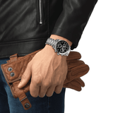 Tissot PRS 516 Men's 40mm quartz chronograph watch featuring stainless steel bracelet, black dial, Tachymeter Bezel, and Date Display - on wrist