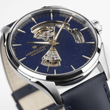 A Hamilton Jazzmaster Men's 42mm automatic watch with a midnight blue dial and a blue leather strap.