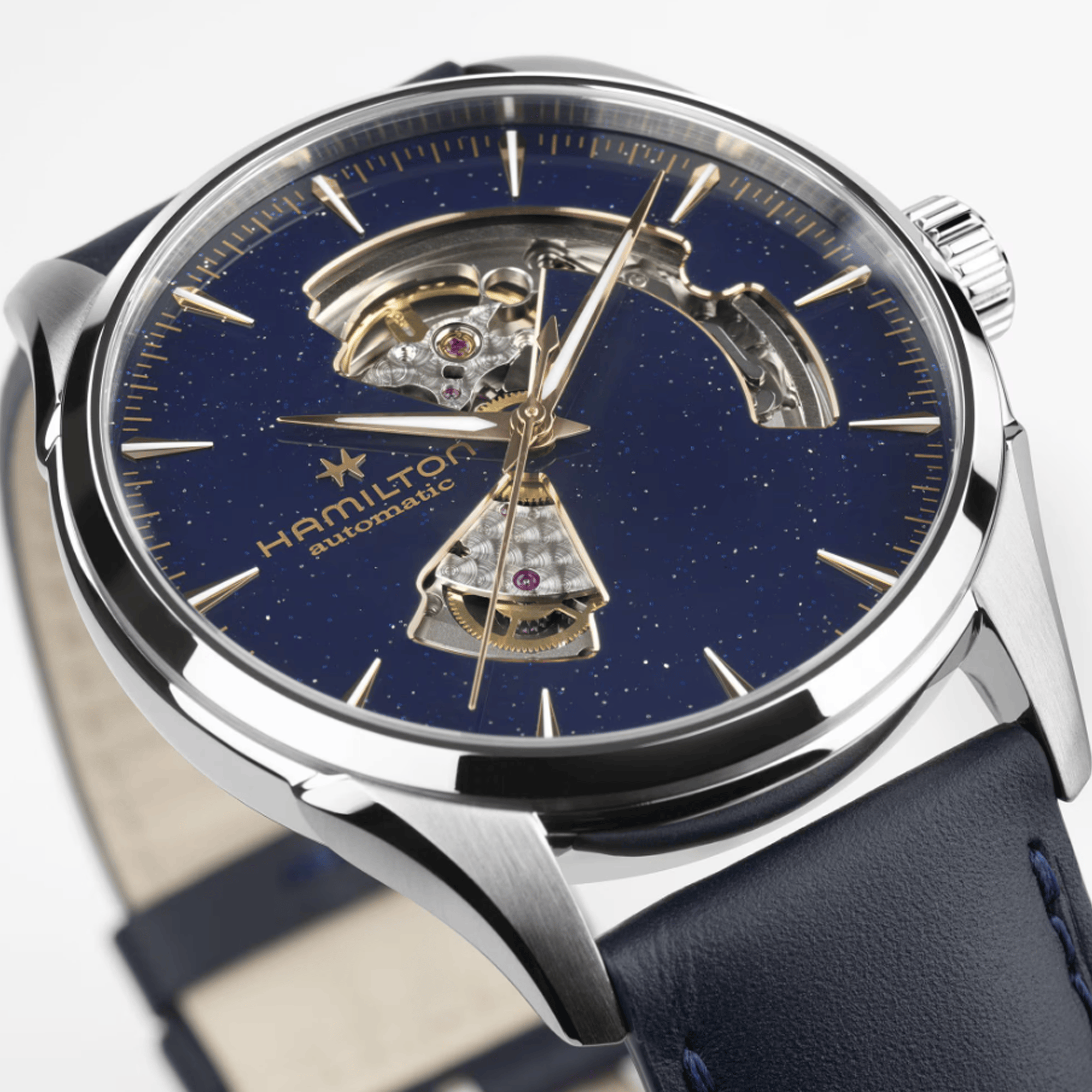 A Hamilton Jazzmaster Men's 42mm automatic watch with a midnight blue dial and a blue leather strap.