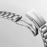 Close-up of a Longines silver watch band clasp