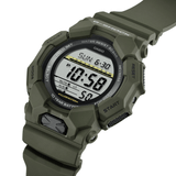 Casio G-SHOCK GD010-3D digital watch featuring green bio-based resin band and case, LCD display, LED backlight, and shock-resistant design.