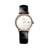 Longines watch with black leather strap and white dial with a diamond bezel