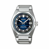 The King Seiko VANAC Men's 41mm Automatic Watch SLA085J features a navy-blue dial with a horizontal stripe pattern, a V-shaped 12 o'clock index and a date window. The 41mm stainless steel case is fitted with box-shaped sapphire crystal.