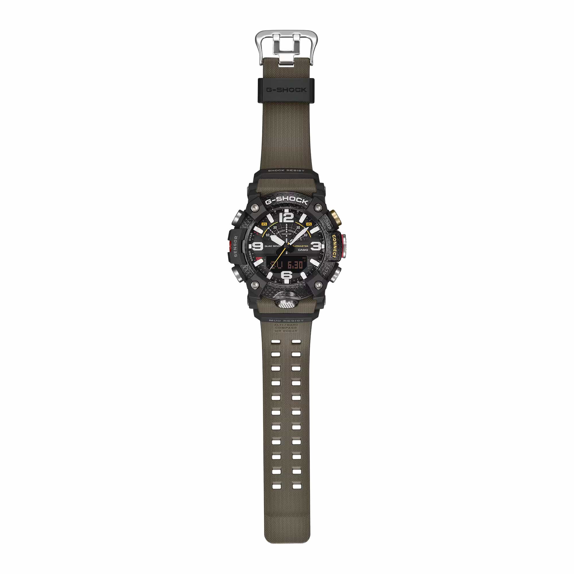 Casio G-Shock Mudmaster GGB100X-1A3 watch front view, featuring a large 55.4mm carbon fibre reinforced resin case with triple-layered carbon bezel, analogue hands, inverted LCD digital display, and khaki band accents on a black base - showing full length of strap