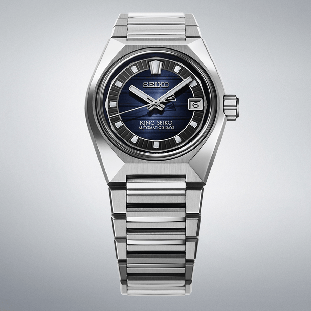 From this angle, the King Seiko VANAC Men's 41mm Automatic Watch SLA085J shows the navy-blue dial's three-dimensional pattern and V-shaped index together with the case's mirror and hairline finishes.