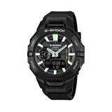 Casio G-Shock G-Squad GBA950-1A watch front view, featuring a 48.5mm all-black round carbon fibre-reinforced resin case with integrated bezel and band design, phosphorescent analogue-digital combination dial, hand shift feature, and G-Squad branding.