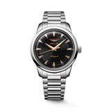 Silver Longines watch with black dial on a light gray background - 1