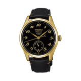 The Seiko Presage Automatic 39.60mm Watch HCC006J features a black urushi lacquer dial with Breguet-style numerals finished in gold powder lacquer. The 39.6mm yellow gold-coloured case is fitted with dual-curved sapphire crystal.
