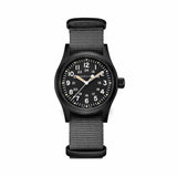 Hamilton Khaki Field Mechanical 38mm Watch H69409930 features a black dial with triangular indexes coated in old radium-tone Super-LumiNova. The black PVD-coated stainless steel case gives the watch a subtle, military-inspired colour scheme.