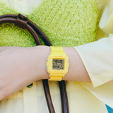 Casio Baby-G BGD10KH-9D digital watch with pastel yellow resin band on wrist