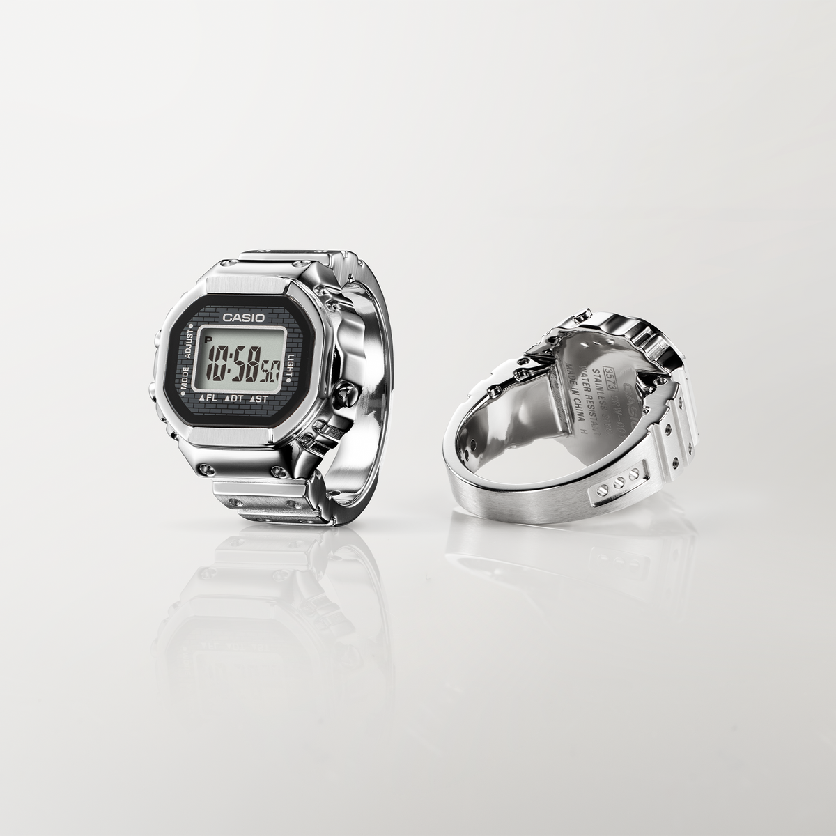 Side profile of the Casio Ring Watch Digital 25mm Watch CRW001-1D, showing the compact stainless steel case depth and mineral glass face. The ring's seamless, one-piece construction is visible along its profile.