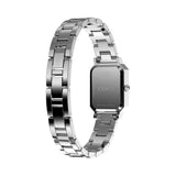 Back of case - Timex Vivienne women’s watch with white Roman numeral dial, silver-tone bracelet, and petite rectangular silver-tone case in an elegant vintage-inspired dress watch design.