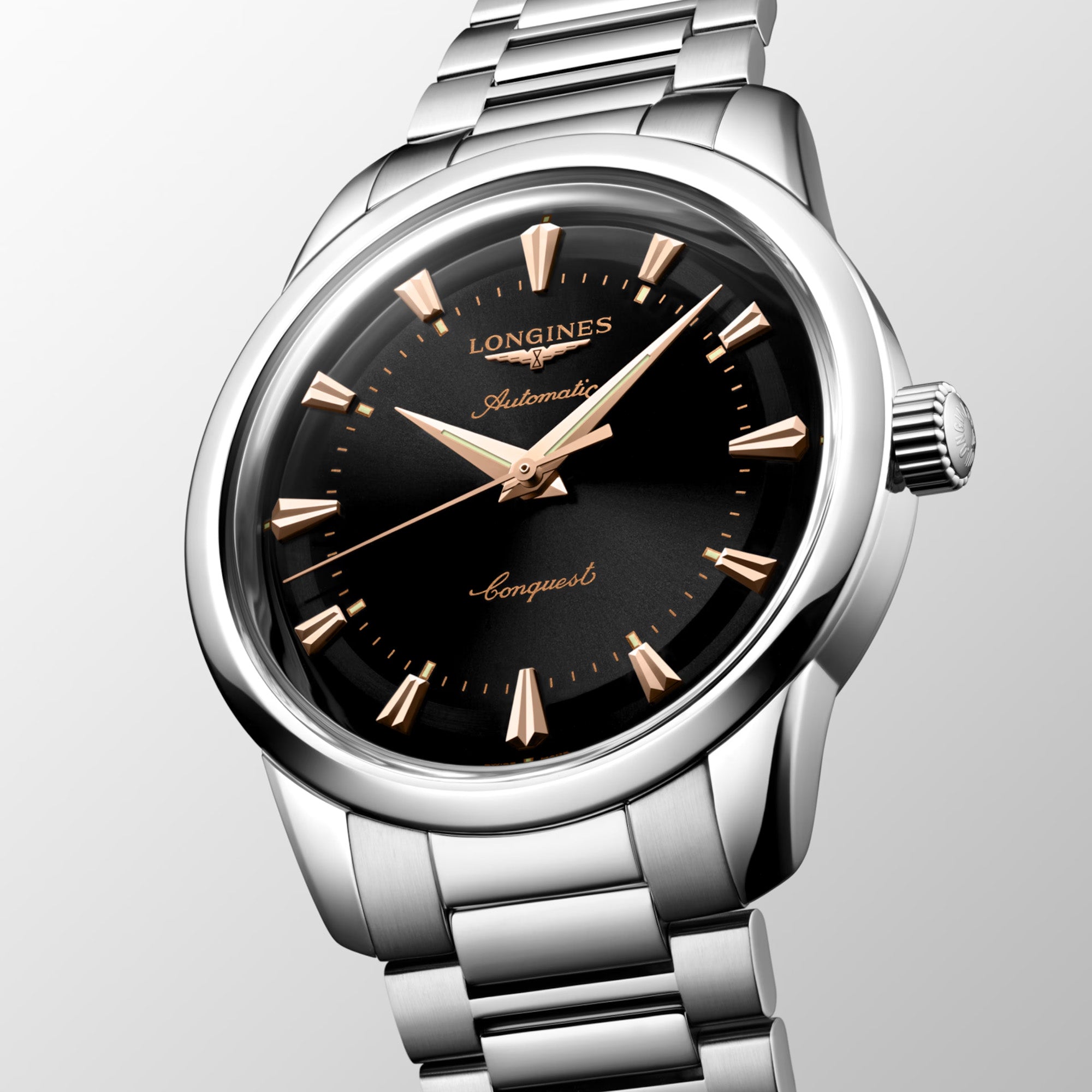 Silver Longines watch with black dial on a light gray background - 3