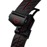 Close-up of a Tag Heuer watch strap with red stitching