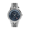 The Timex Marlin Quartz GMT TW2Y47600 features a blue sunray dial with faceted markers and a red triangle GMT hand. A date window sits at the 3 o'clock position.