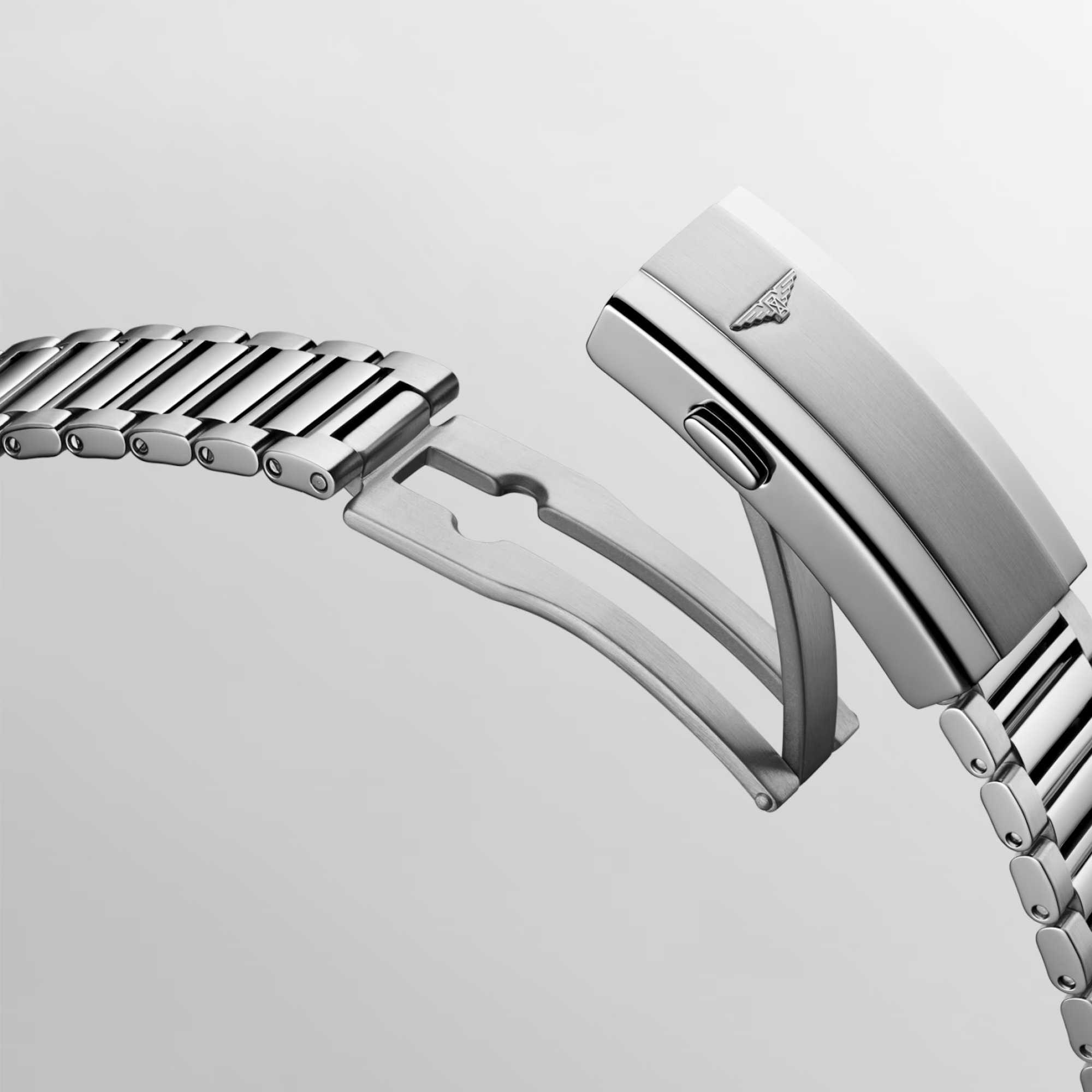 Silver Longines watch with black dial on a light gray background - 6