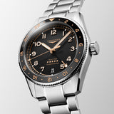 Silver Longines watch with black dial and rose gold accents