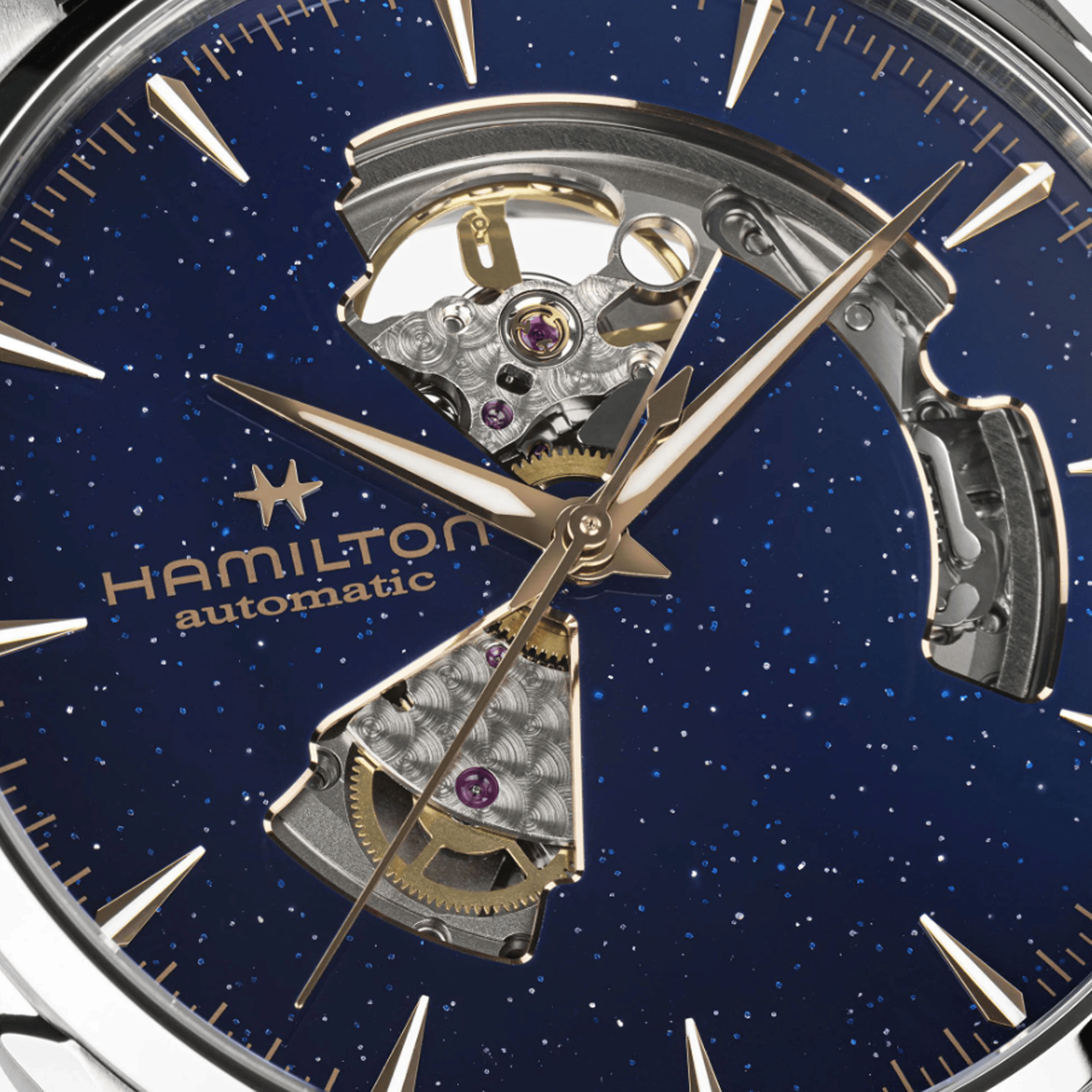 Close up of a Hamilton Automatic Watch Dial with Midnight Blue Backing and partially open mechanical features.
