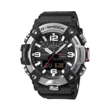 Casio G-SHOCK Mudmaster GGB100XM-1A analogue digital watch with black carbon fibre bezel, rugged resin band, and mud-resistant outdoor design.