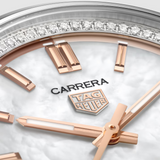 Close up of Tag Heuer watch with Rose Gold Accents and Diamonds