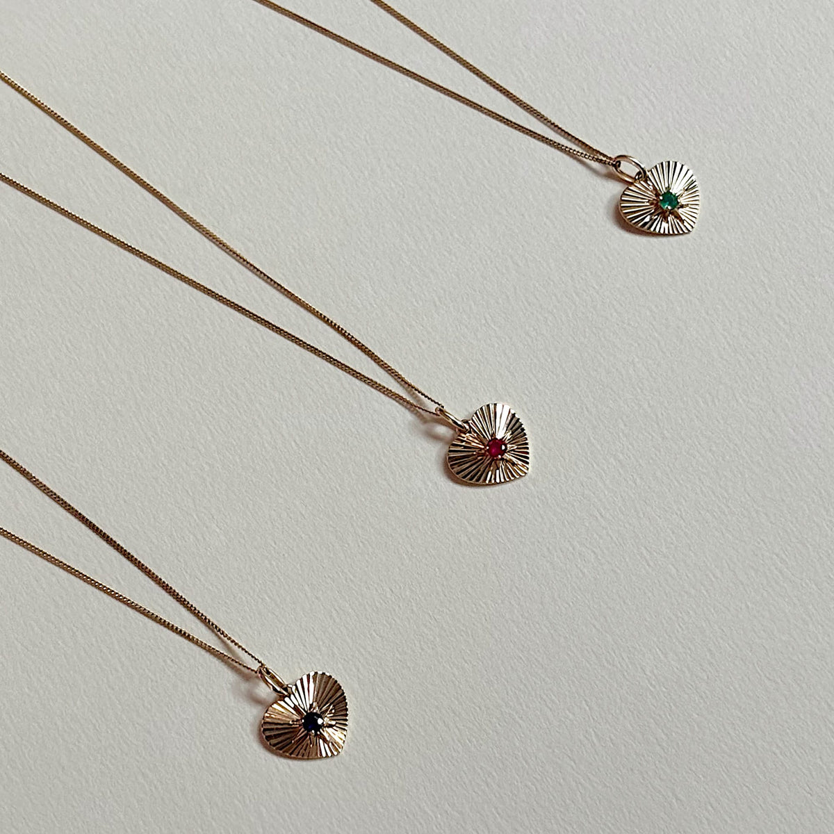 Created Emerald Heart Starburst Pendant in 9ct Yellow Gold