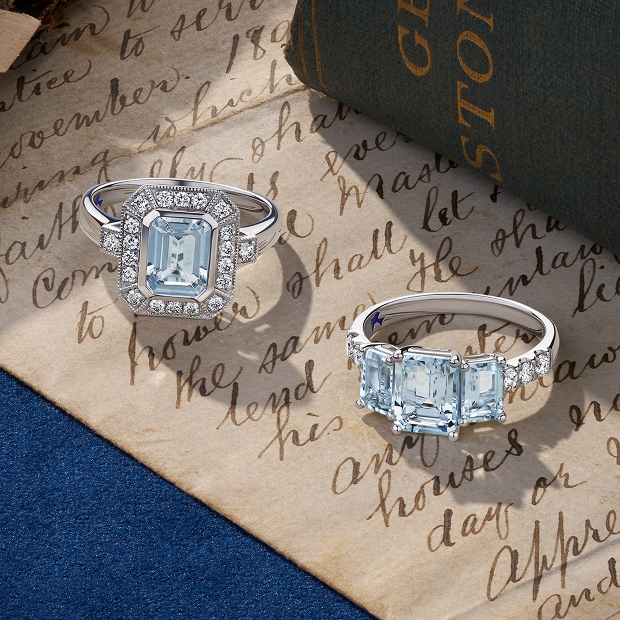 Two white gold diamond and aquamarine rings