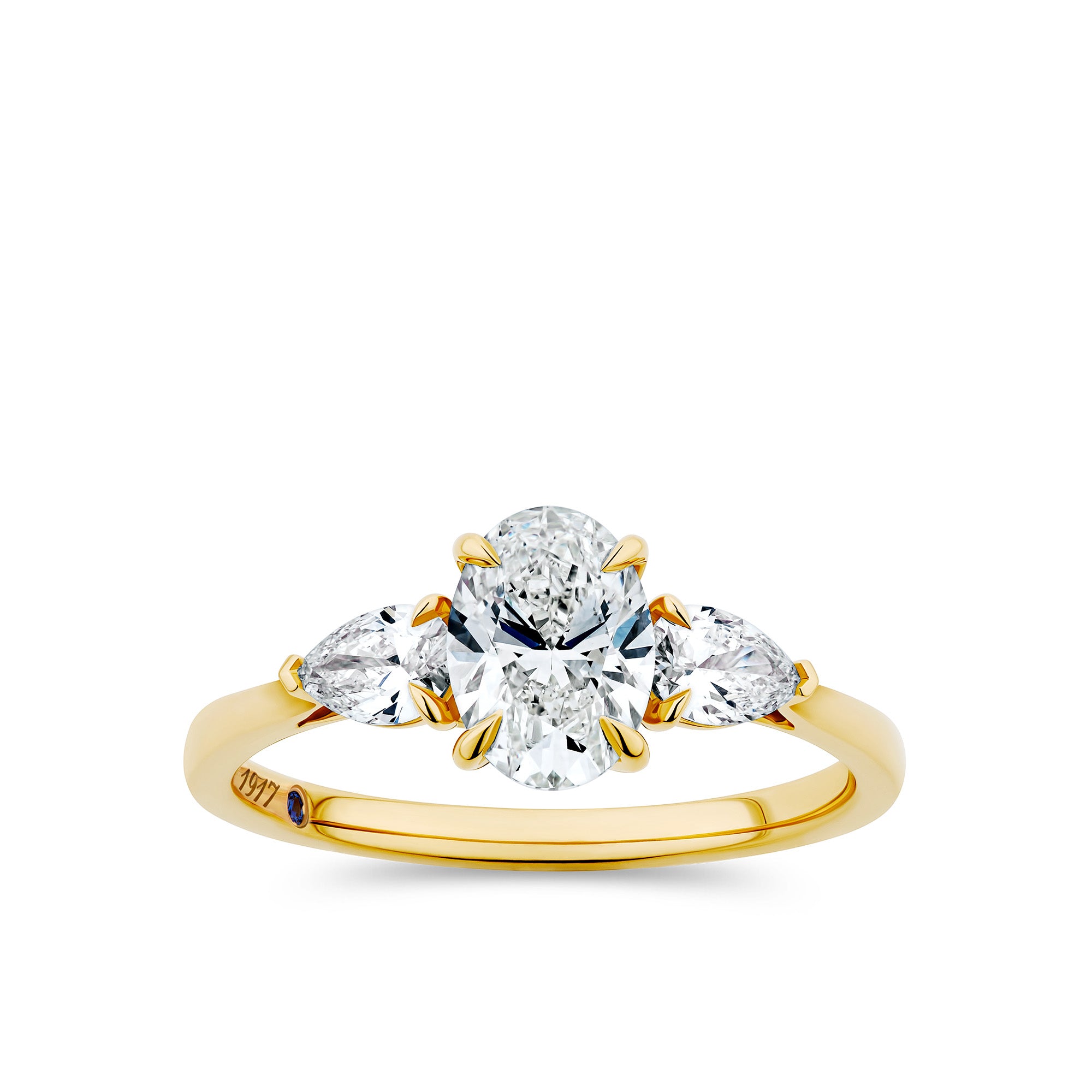 Gold ring with three diamonds