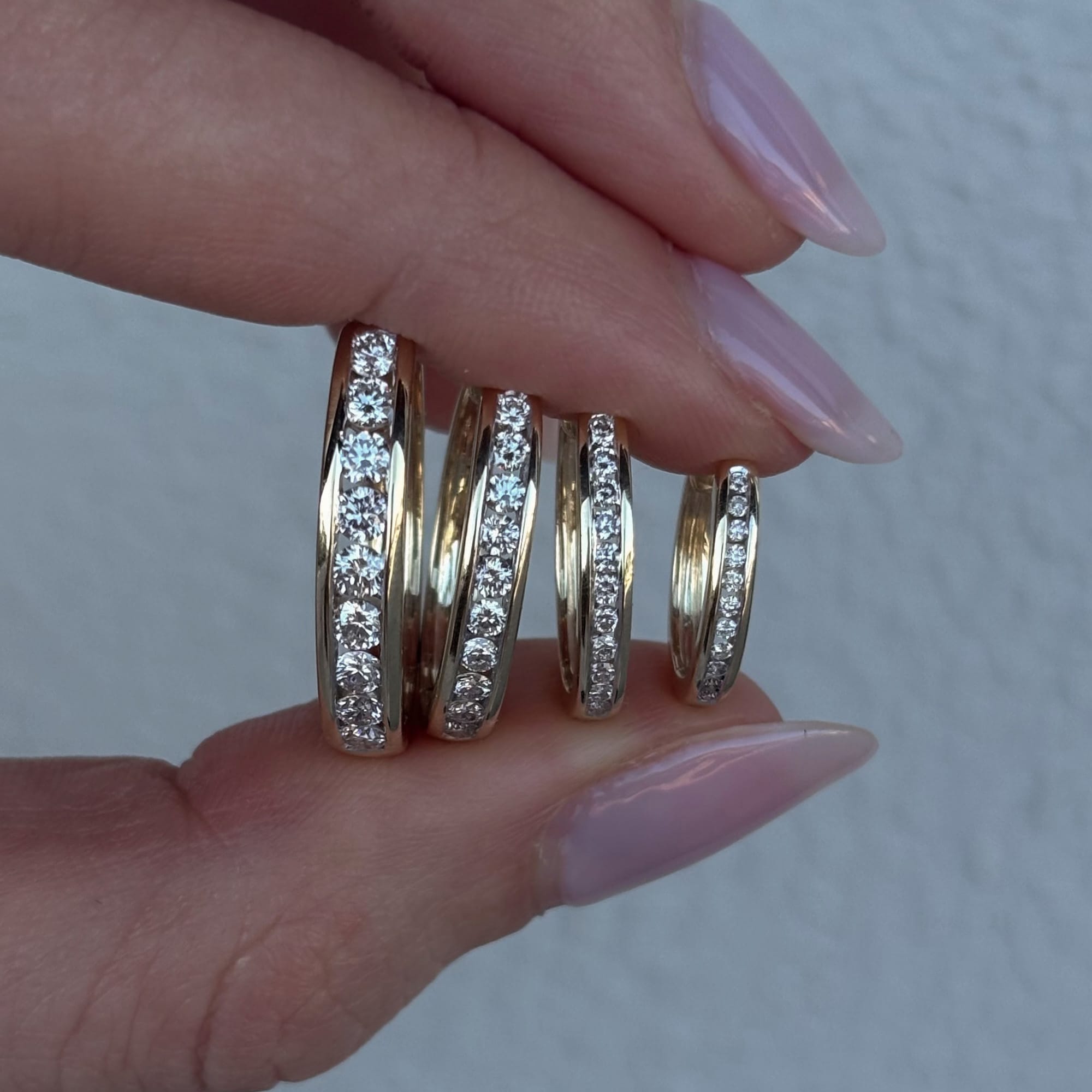 0.25ct TW Channel Set Diamond Oval Huggie in 9ct Yellow Gold