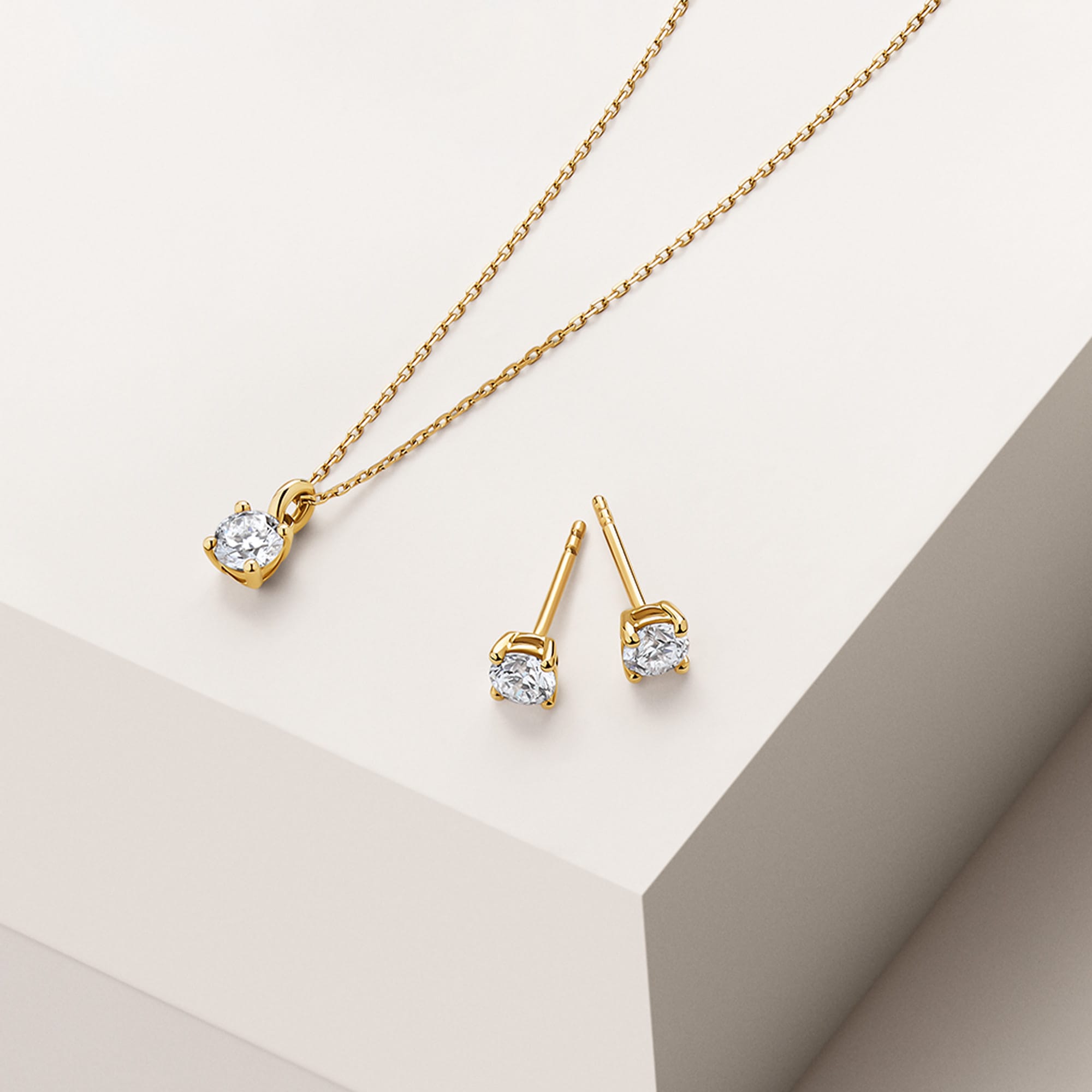 0.75ct TW Round Brilliant Cut Lab-Grown Diamond Pendant and Earrings Set in 9ct Yellow Gold