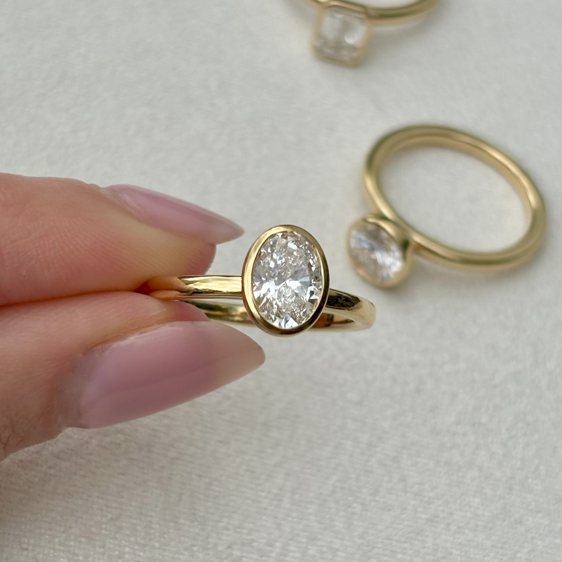 Everlasting 1.25ct TW Lab-Grown Diamond Oval Cut Bezel Set Solitaire Engagement Ring in 18ct Yellow Gold